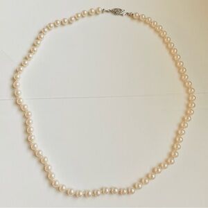 Vintage Signed GSILVER Pat.P Individually
Knotted Cream Faux Pearl
Necklace